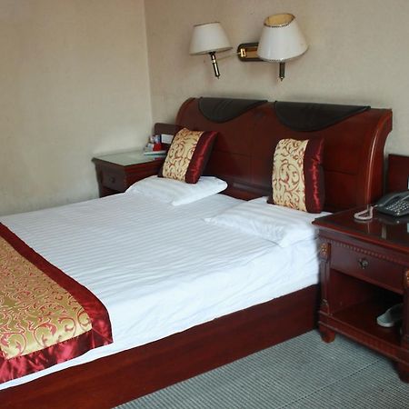 Taizhou Taishan Business Hotel Zimmer foto