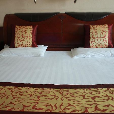 Taizhou Taishan Business Hotel Zimmer foto