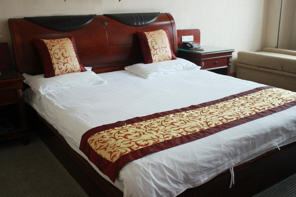 Taizhou Taishan Business Hotel Zimmer foto