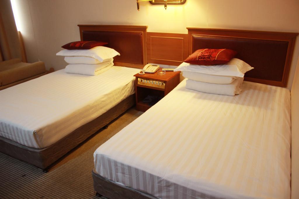 Taizhou Taishan Business Hotel Zimmer foto