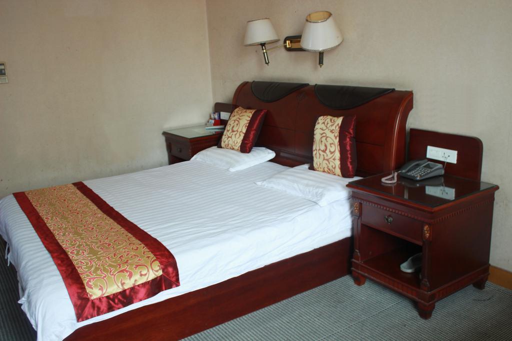 Taizhou Taishan Business Hotel Zimmer foto