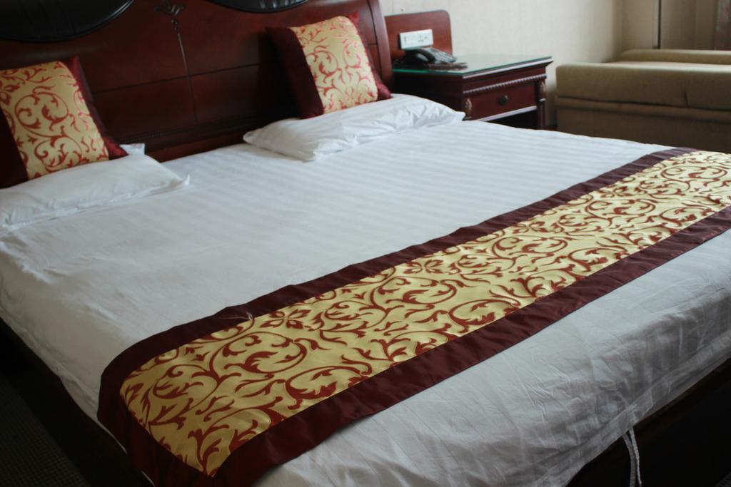 Taizhou Taishan Business Hotel Zimmer foto