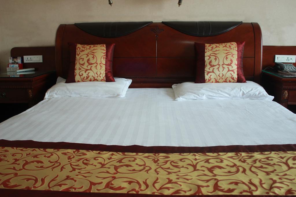 Taizhou Taishan Business Hotel Zimmer foto